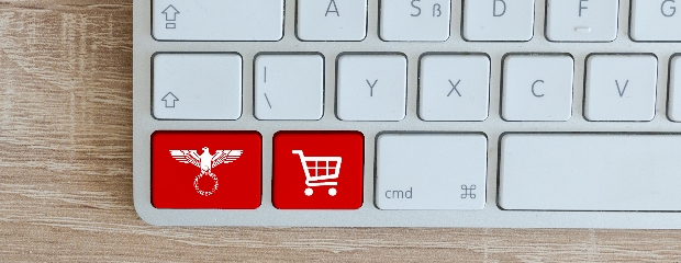 Tastatur mit zwei roten Tasten. Auf den Tasten ist ein Reichsadler und ein Einkaufswagen symbolisch abgebildet. 
